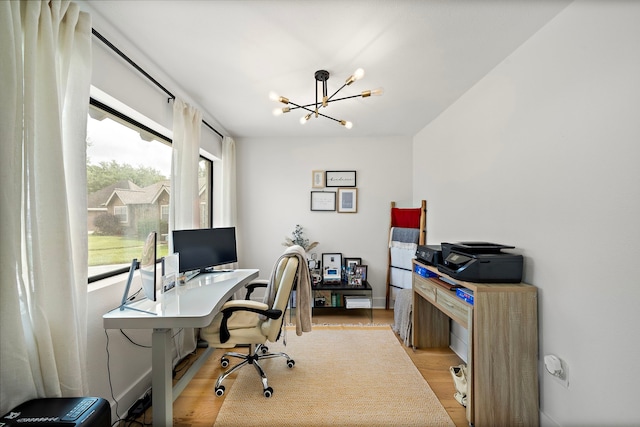 1902 Knoboak Cir, Houston, TX 77080 - office area featuring a chandelier and light wood-type flooring