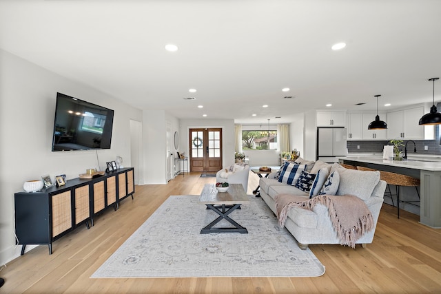 1902 Knoboak Cir, Houston, TX 77080 - living room featuring recessed lighting and light wood finished floors
