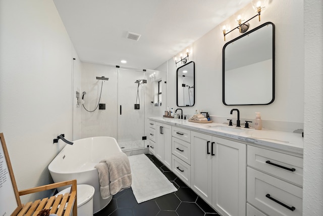 1902 Knoboak Cir, Houston, TX 77080 - full bath featuring a shower stall, tile patterned flooring, double vanity, and a freestanding bath