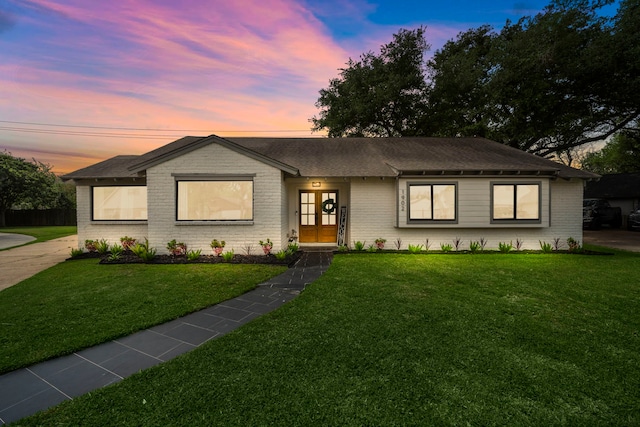 1902 Knoboak Cir, Houston, TX 77080 - single story home with brick siding, a front yard, french doors, and roof with shingles