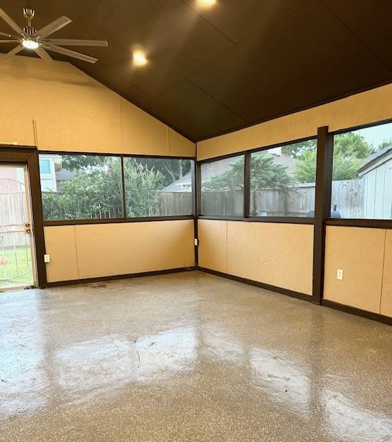 11403 High Bridge Ct, Houston, TX 77065 - unfurnished sunroom featuring vaulted ceiling