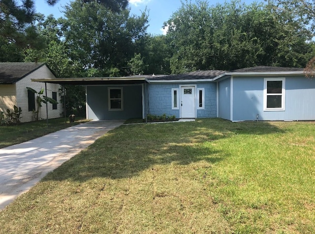 5223 Windemere St, Houston, TX 77033 - ranch-style home with driveway, a front yard, and a carport