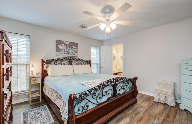 3305 Park Shadow Ln, Deer Park, TX 77536 - bedroom with multiple windows, wood finished floors, baseboards, and ceiling fan