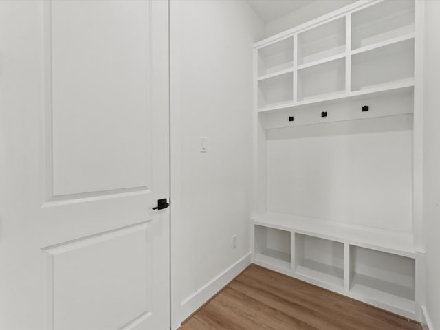 7729 Ave J Unit A, Houston, TX 77012 - mudroom featuring wood finished floors and baseboards