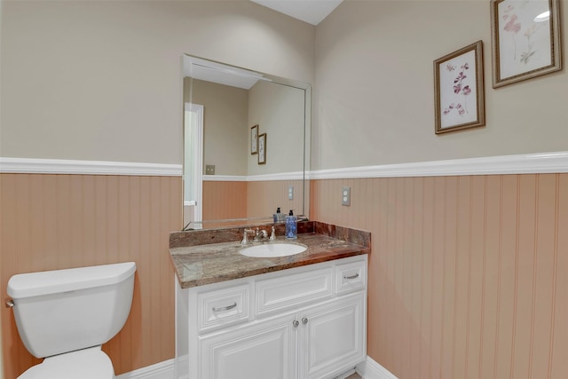 14806 Cantwell Bnd, Cypress, TX 77429 - half bath featuring wainscoting and vanity
