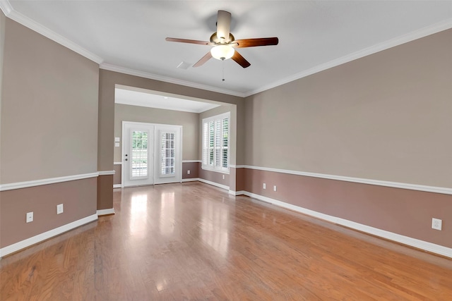 14806 Cantwell Bnd, Cypress, TX 77429 - spare room with a ceiling fan, wood finished floors, and crown molding