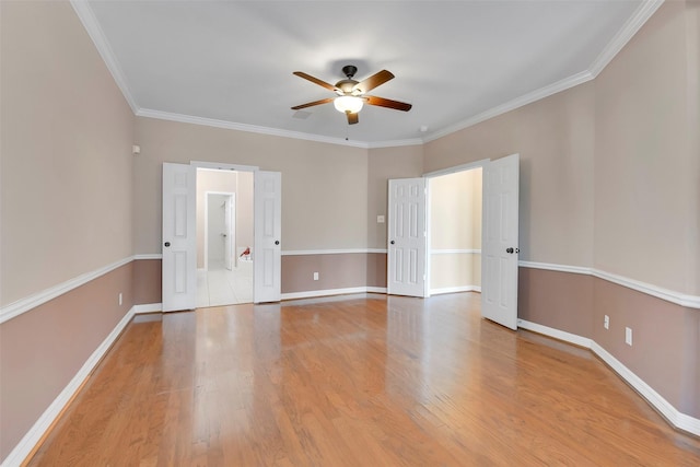14806 Cantwell Bnd, Cypress, TX 77429 - unfurnished room featuring ceiling fan, ornamental molding, and light wood-type flooring