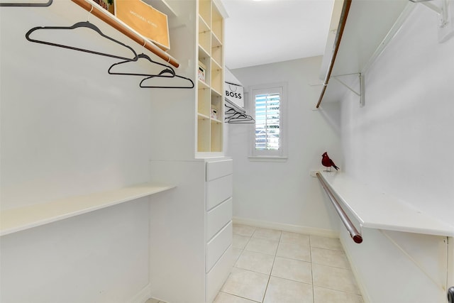 14806 Cantwell Bnd, Cypress, TX 77429 - walk in closet with light tile patterned flooring