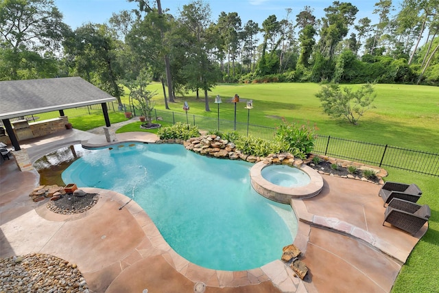 14806 Cantwell Bnd, Cypress, TX 77429 - view of swimming pool with view of wooded area, a pool with connected hot tub, a patio, and a gazebo