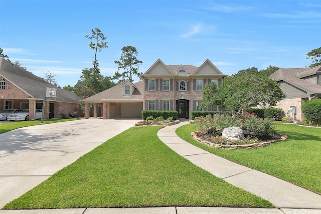 14806 Cantwell Bnd, Cypress, TX 77429 - view of front of house featuring brick siding, concrete driveway, a front yard, and an attached garage
