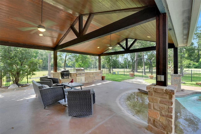 14806 Cantwell Bnd, Cypress, TX 77429 - fenced backyard with exterior kitchen, a ceiling fan, a gazebo, and a patio