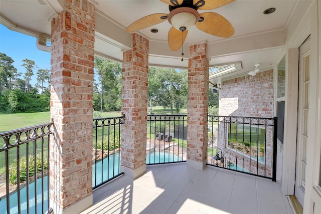 14806 Cantwell Bnd, Cypress, TX 77429 - balcony with view of pool and a ceiling fan