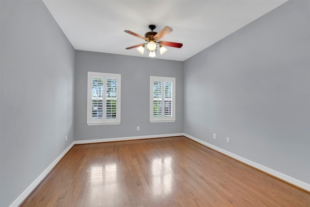 14806 Cantwell Bnd, Cypress, TX 77429 - unfurnished room with wood finished floors and ceiling fan