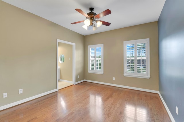 14806 Cantwell Bnd, Cypress, TX 77429 - spare room featuring ceiling fan and wood finished floors