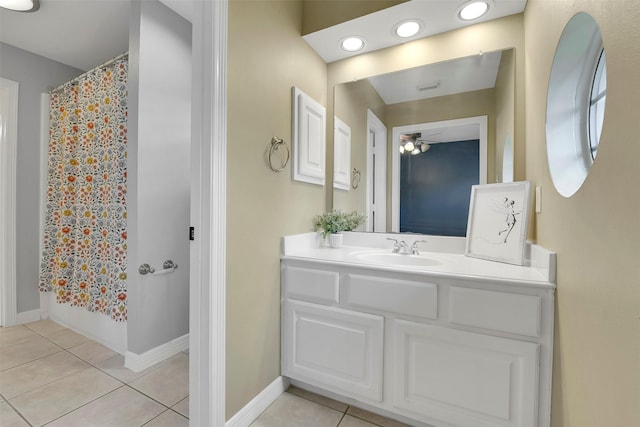 14806 Cantwell Bnd, Cypress, TX 77429 - full bath with tile patterned flooring, a ceiling fan, and vanity