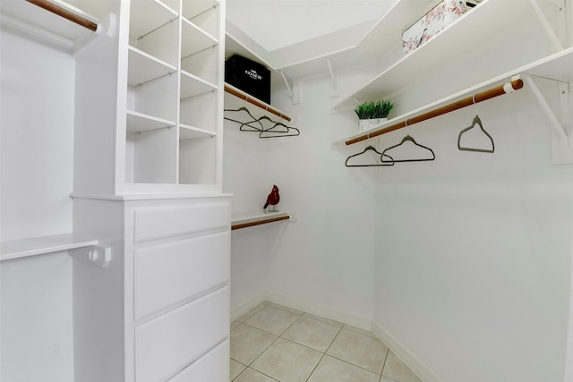 14806 Cantwell Bnd, Cypress, TX 77429 - spacious closet featuring light tile patterned floors