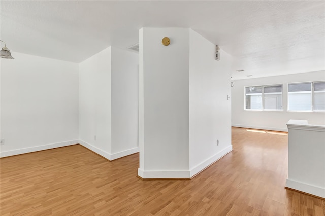 26881 Manor Crest Ct, Kingwood, TX 77339 - bonus room with light wood finished floors and baseboards