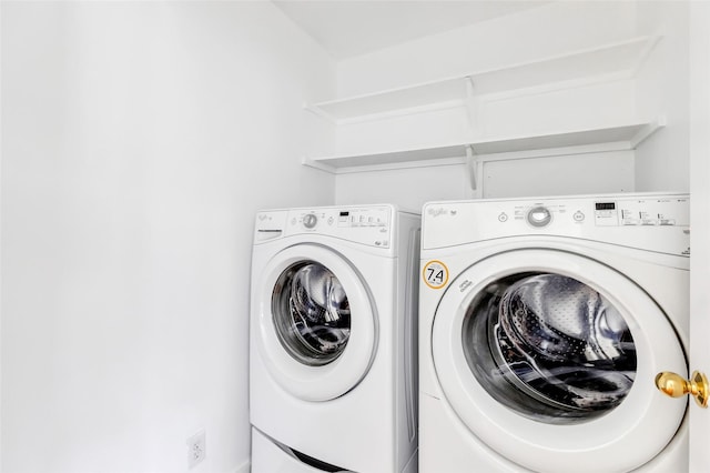 26881 Manor Crest Ct, Kingwood, TX 77339 - laundry area featuring separate washer and dryer