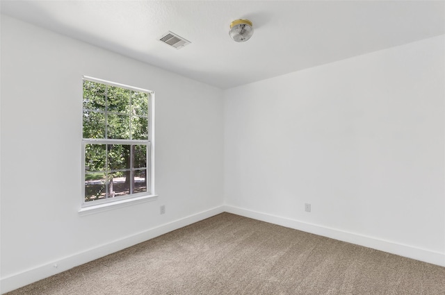 26881 Manor Crest Ct, Kingwood, TX 77339 - unfurnished room featuring carpet and baseboards