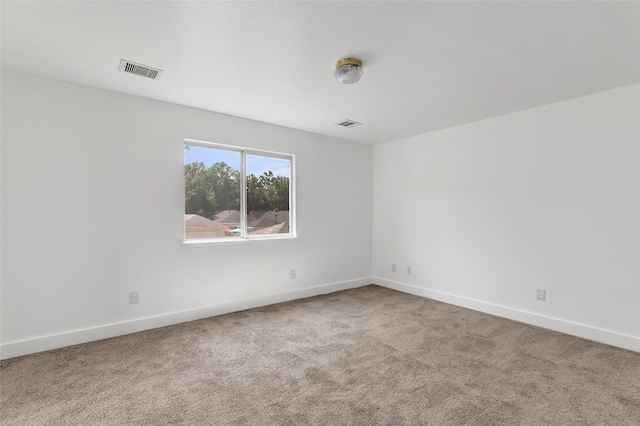 26881 Manor Crest Ct, Kingwood, TX 77339 - carpeted empty room with baseboards
