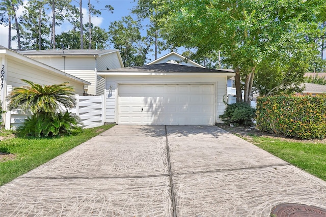 26881 Manor Crest Ct, Kingwood, TX 77339 - garage featuring driveway