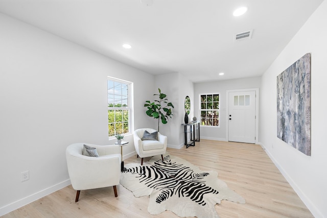 1310 E 34th St, Houston, TX 77022 - sitting room featuring healthy amount of natural light, light wood-style flooring, recessed lighting, and baseboards