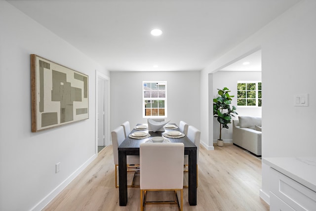 1310 E 34th St, Houston, TX 77022 - dining area with light wood finished floors, recessed lighting, and baseboards