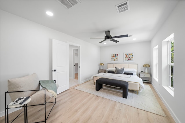 1310 E 34th St, Houston, TX 77022 - bedroom featuring light wood-style floors, baseboards, recessed lighting, and ceiling fan