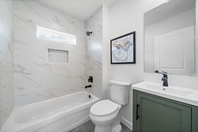 1310 E 34th St, Houston, TX 77022 - full bathroom with vanity, washtub / shower combination, toilet, and baseboards