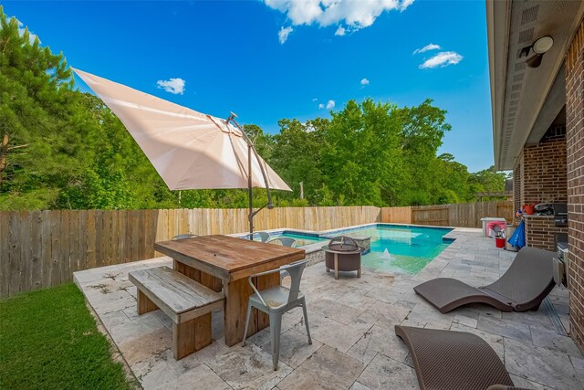 13707 Rivendell Crest Ln, Cypress, TX 77429 - view of pool featuring a patio, a fenced backyard, and a pool with connected hot tub