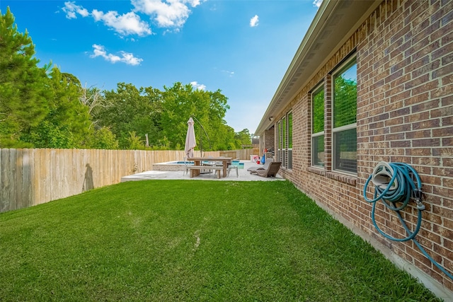 13707 Rivendell Crest Ln, Cypress, TX 77429 - fenced backyard featuring a patio