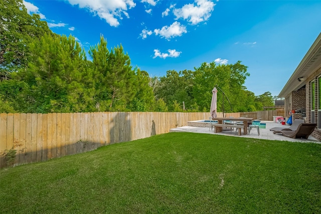 13707 Rivendell Crest Ln, Cypress, TX 77429 - fenced backyard featuring a patio