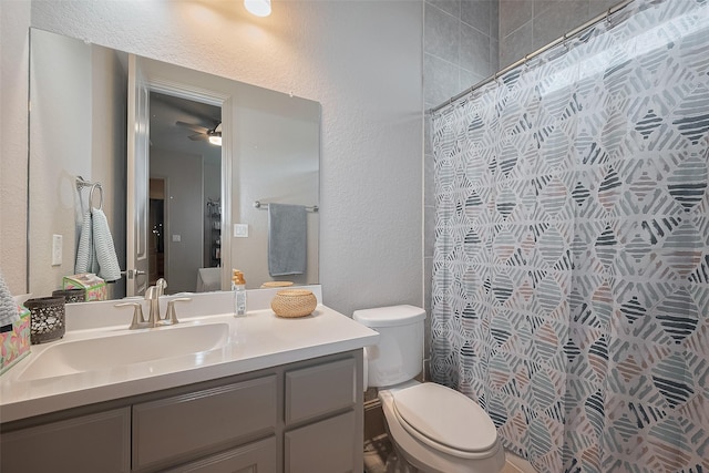 13707 Rivendell Crest Ln, Cypress, TX 77429 - full bath with a textured wall, vanity, a shower with curtain, and ceiling fan