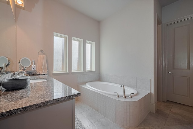 13707 Rivendell Crest Ln, Cypress, TX 77429 - bathroom with vanity, tile patterned flooring, and a bath