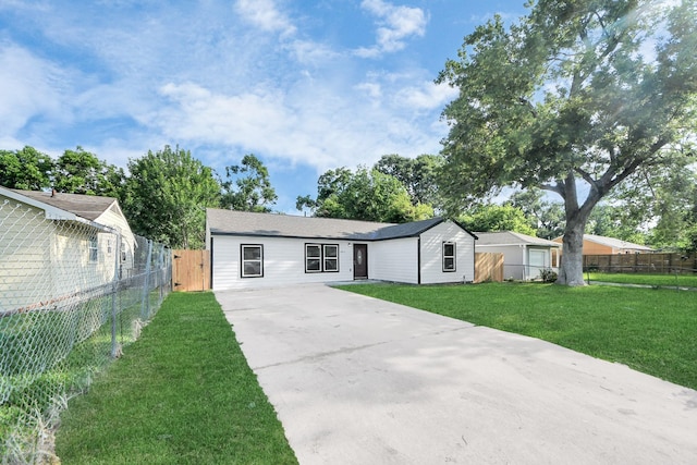 5911 Southurst St, Houston, TX 77033 - single story home with concrete driveway