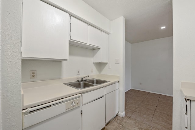 12500 Sandpiper Dr Unit 5, Houston, TX 77035 - kitchen featuring white dishwasher, a sink, white cabinetry, light countertops, and baseboards