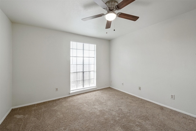 12500 Sandpiper Dr Unit 5, Houston, TX 77035 - carpeted spare room featuring baseboards and ceiling fan
