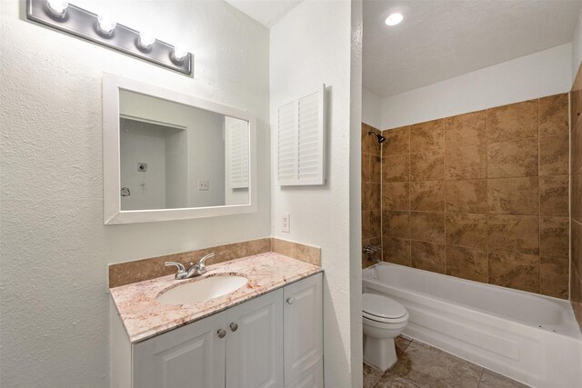 12500 Sandpiper Dr Unit 5, Houston, TX 77035 - full bathroom featuring toilet, vanity, bathtub / shower combination, and tile patterned floors