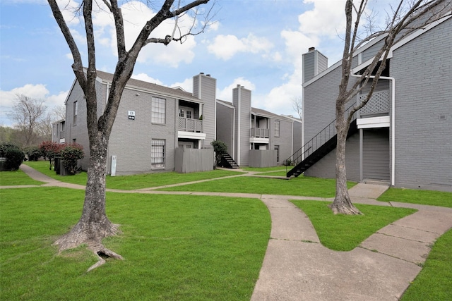 12500 Sandpiper Dr Unit 5, Houston, TX 77035 - view of property's community with stairs and a yard