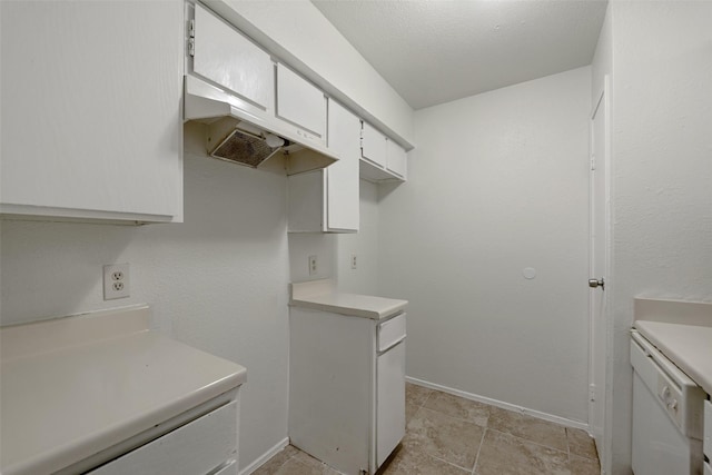 12500 Sandpiper Dr Unit 5, Houston, TX 77035 - kitchen with white cabinets, light countertops, and baseboards