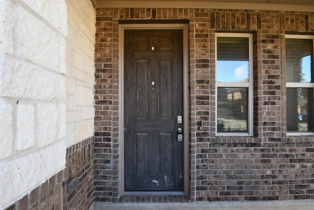14623 Monterey Cypress Dr, Houston, TX 77068 - view of exterior entry with brick siding