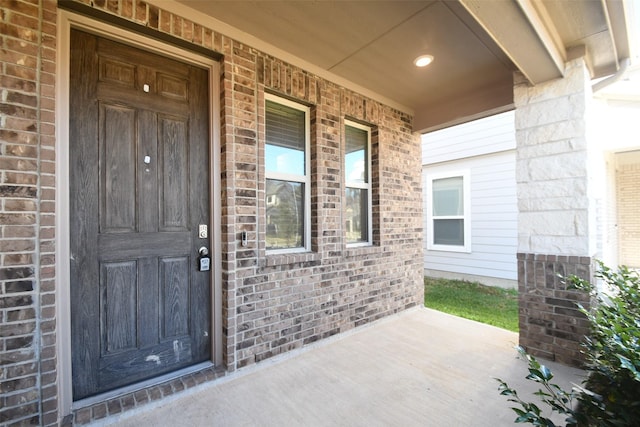 14623 Monterey Cypress Dr, Houston, TX 77068 - property entrance with covered porch and brick siding