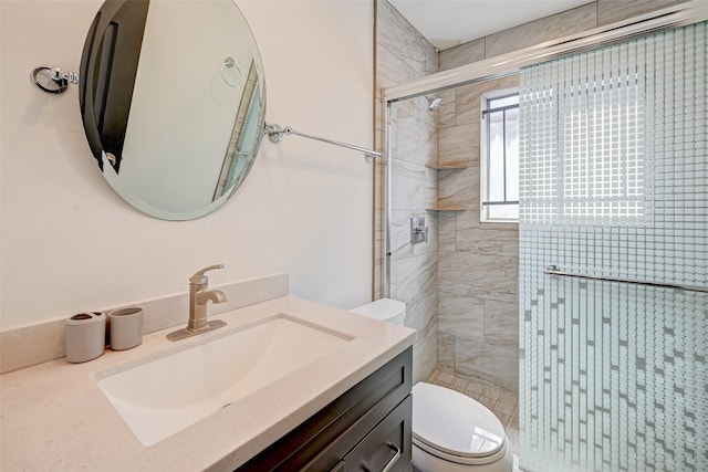 5863 Inwood Dr Unit 5, Houston, TX 77057 - bathroom featuring toilet, a shower stall, and vanity