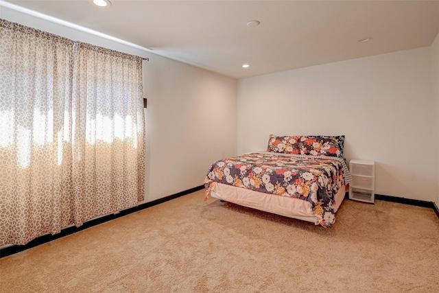 5863 Inwood Dr Unit 5, Houston, TX 77057 - carpeted bedroom featuring baseboards and recessed lighting