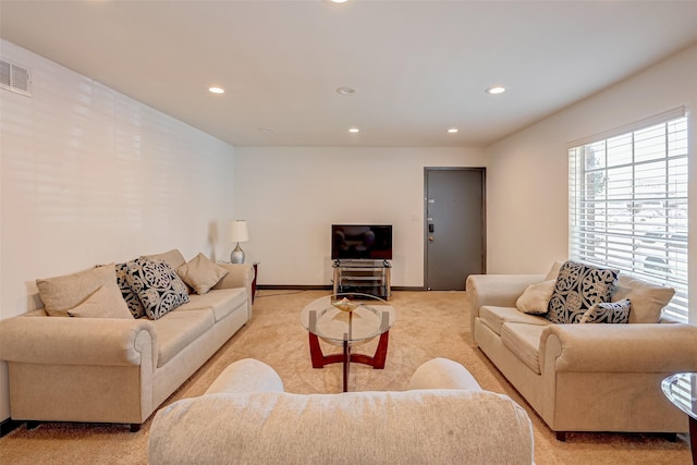 5863 Inwood Dr Unit 5, Houston, TX 77057 - living room with light carpet, recessed lighting, and baseboards