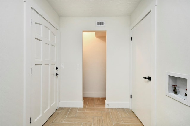 1003 Crescent Blvd, Cleveland, TX 77327 - laundry room featuring baseboards and hookup for a washing machine