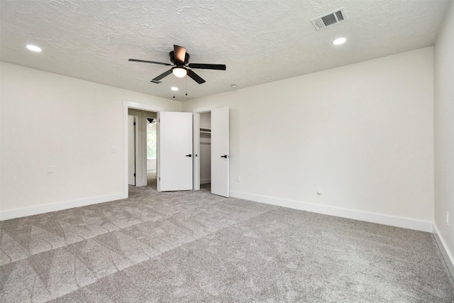 1003 Crescent Blvd, Cleveland, TX 77327 - unfurnished bedroom featuring carpet, baseboards, recessed lighting, and a textured ceiling