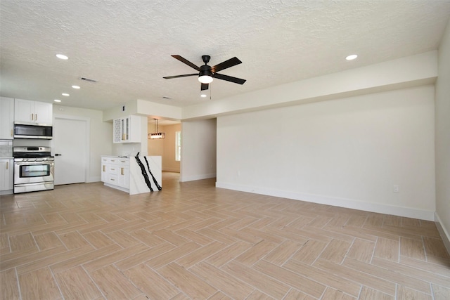 1003 Crescent Blvd, Cleveland, TX 77327 - unfurnished living room with a ceiling fan, baseboards, recessed lighting, and a textured ceiling