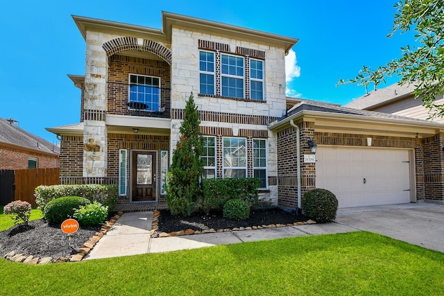 26706 Grey Swan Dr, Katy, TX 77494 - view of front of property featuring a garage, stone siding, concrete driveway, and brick siding