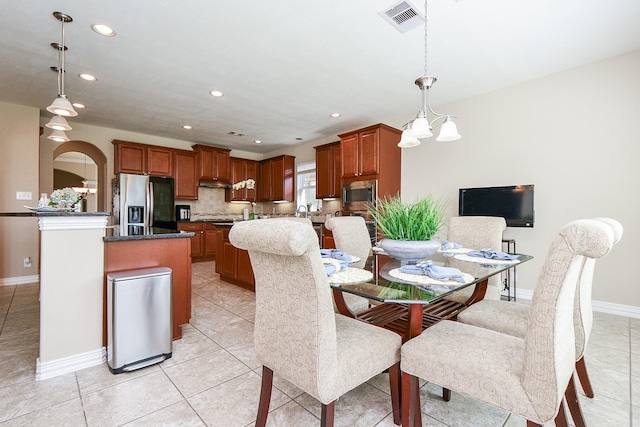 26706 Grey Swan Dr, Katy, TX 77494 - dining space with recessed lighting, baseboards, and light tile patterned floors